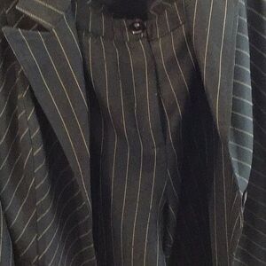 Xoxo,black suit with small orange stripes